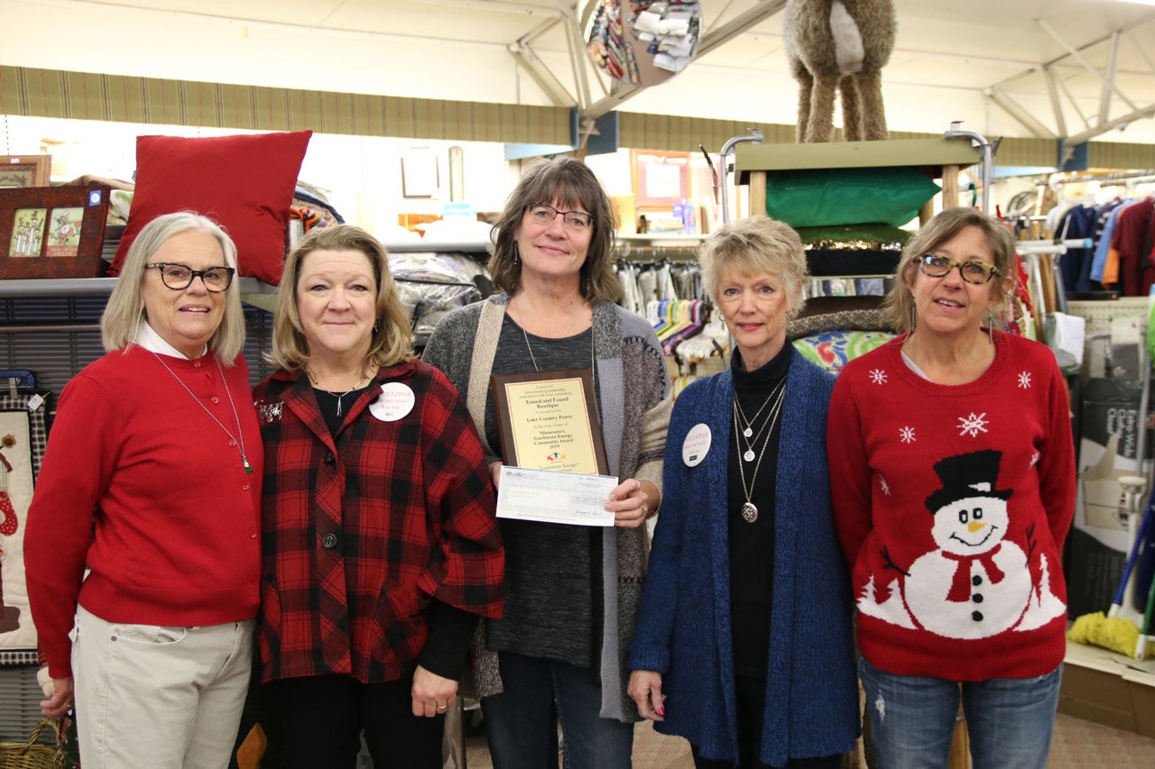 Volunteers at Tossed and Found Boutique in Longville, Minn.